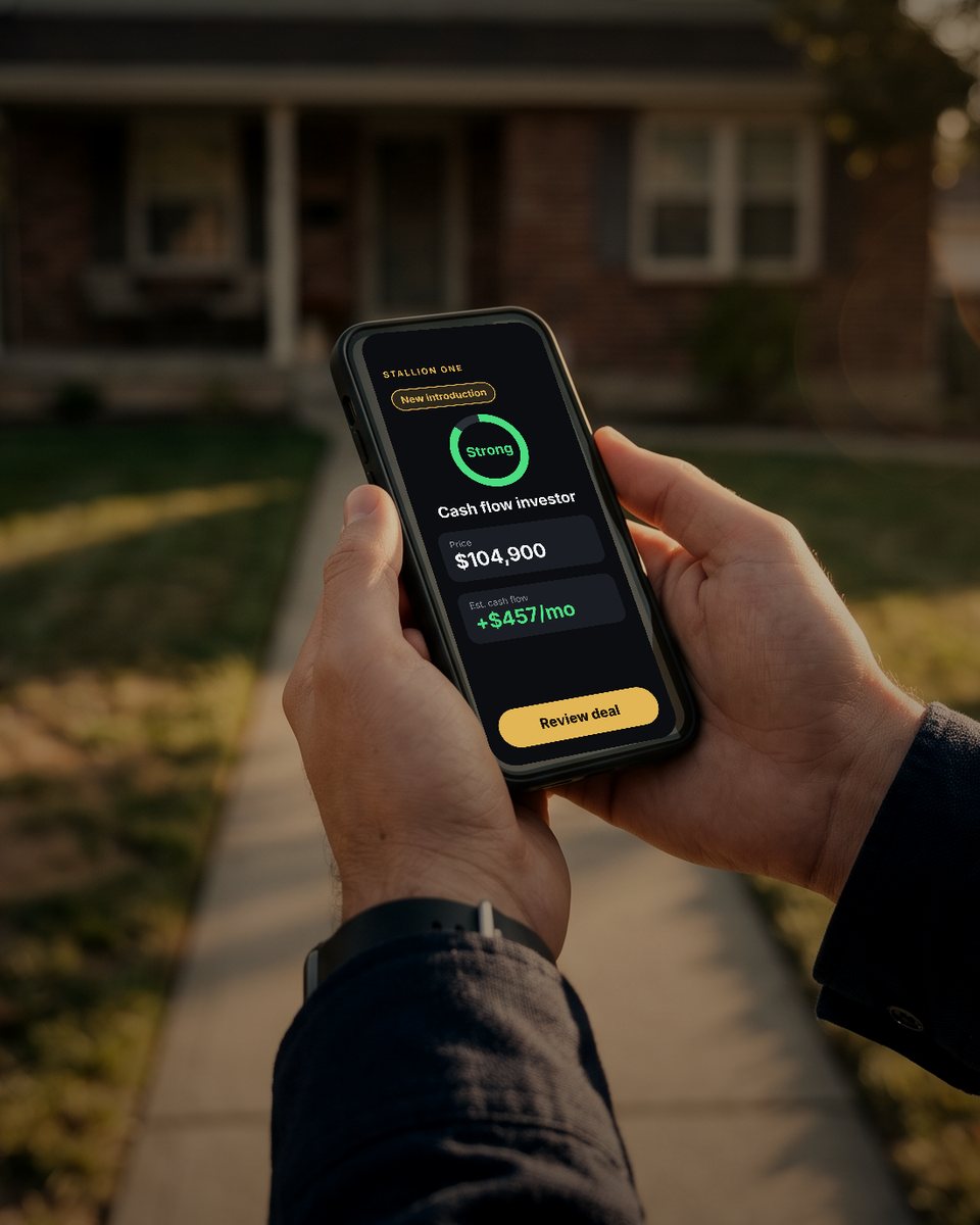 A Partner Agent outside a single-family home, holding a phone showing a new Stallion ONE introduction for a cash flow investor